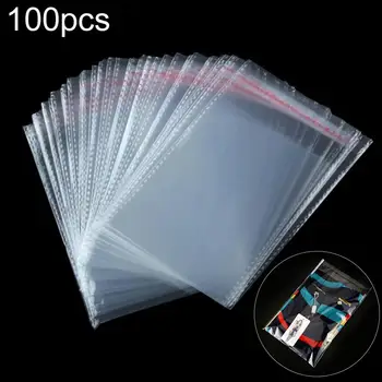100 бр., прозрачен пластмасов калъф, самозалепващи херметически затворени опаковки, опаковъчна хартия за бижута, чанта за носене Изображение